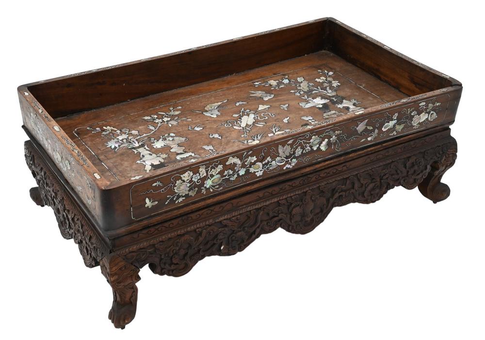 Chinese Carved and Inlaid Rectangular Tea Tray, hardwood, having mother of pearl inlaid flowers,: Chinese Carved and Inlaid Rectangular Tea Tray, hardwood, having mother of pearl inlaid flowers, butterflies and antiquities; base having carved bat and calming clouds; height 7 1/4 inches, length 19 