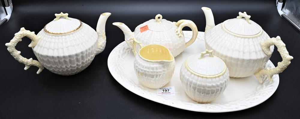 Six Piece Belleek Tea Set, to include three teapots, creamer, sugar, along with a large tray, having (1 of 5)