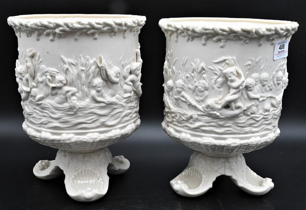 Pair of Belleek Naiads Jardinieres, each having mould putti sides on footed base, remnants of early (1 of 7)