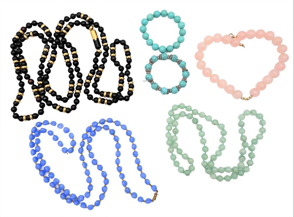 Group of Beaded Necklaces, to include a pink quartz beaded necklace, a light blue beaded necklace, a: Group of Beaded Necklaces, to include a pink quartz beaded necklace, a light blue beaded necklace, a jadeite beaded necklace, a black and gold beaded necklace, along with two turquoise bracelets.