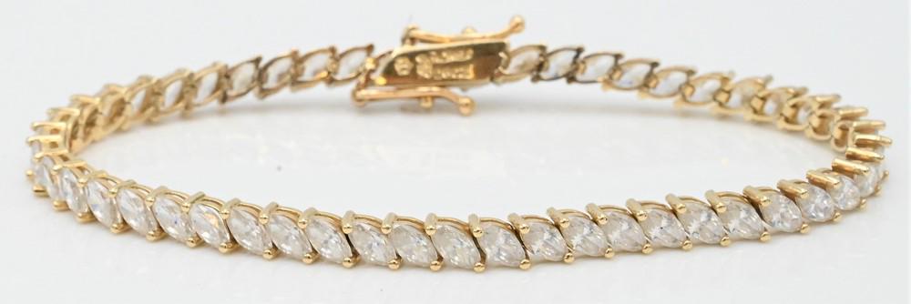 14 Karat Yellow Gold and Diamond Inline Bracelet, set wtih 51 marquis diamonds, approximately 2.4mm (1 of 3)