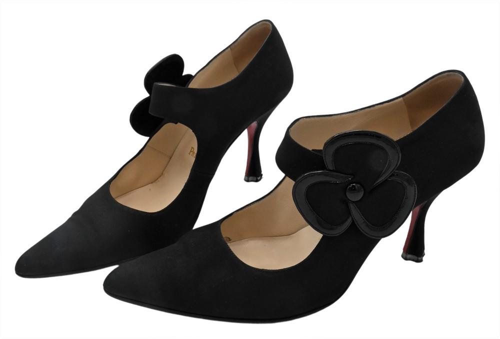 Pair of Christian Louboutin Shoes/Pumps, black with flower snap, having red bottoms. (1 of 5)