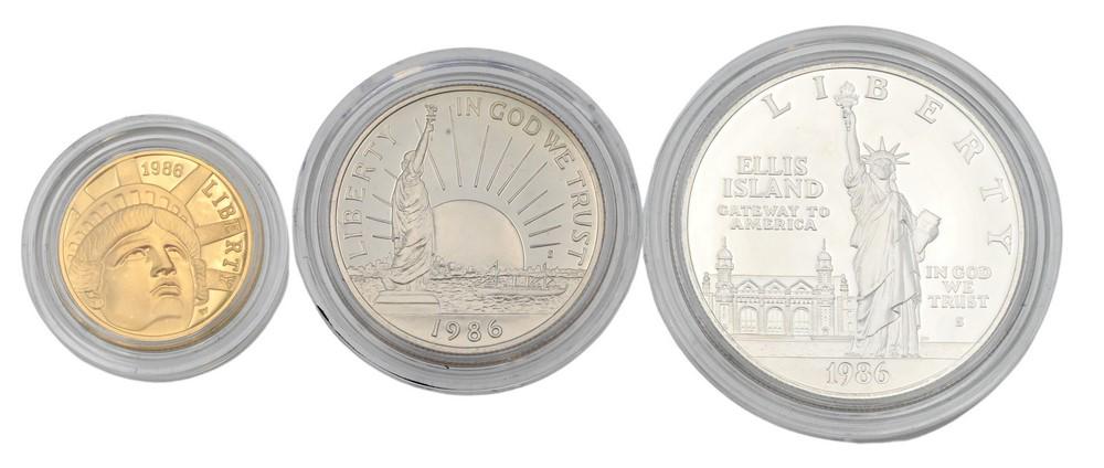 Three Piece 1986 Proof Statue of Liberty Set, to include five dollar gold, one copper nickel half: Three Piece 1986 Proof Statue of Liberty Set, to include five dollar gold, one copper nickel half dollar, along with one silver dollar.