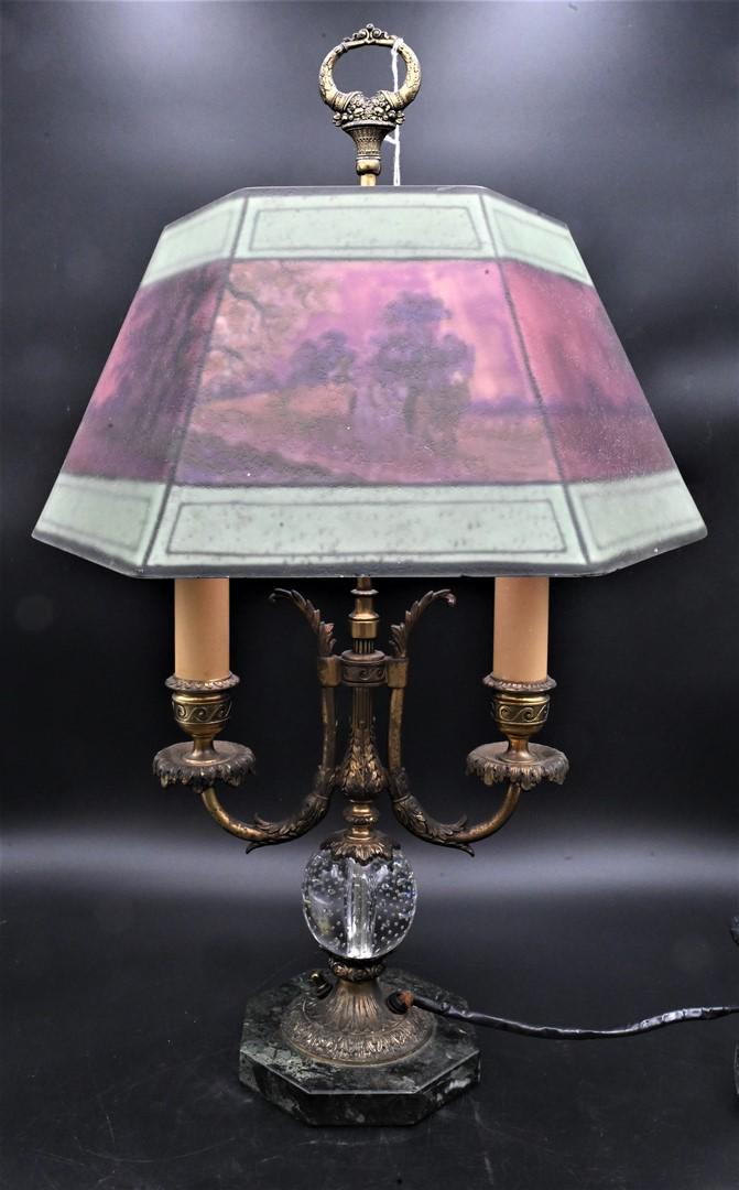 Pairpoint Table Lamp: Pairpoint Table Lamp, having reverse painted hexagon shade, sunset landscape with trees, on base with two arms, height 25 inches, diameter of shade 17 inches.