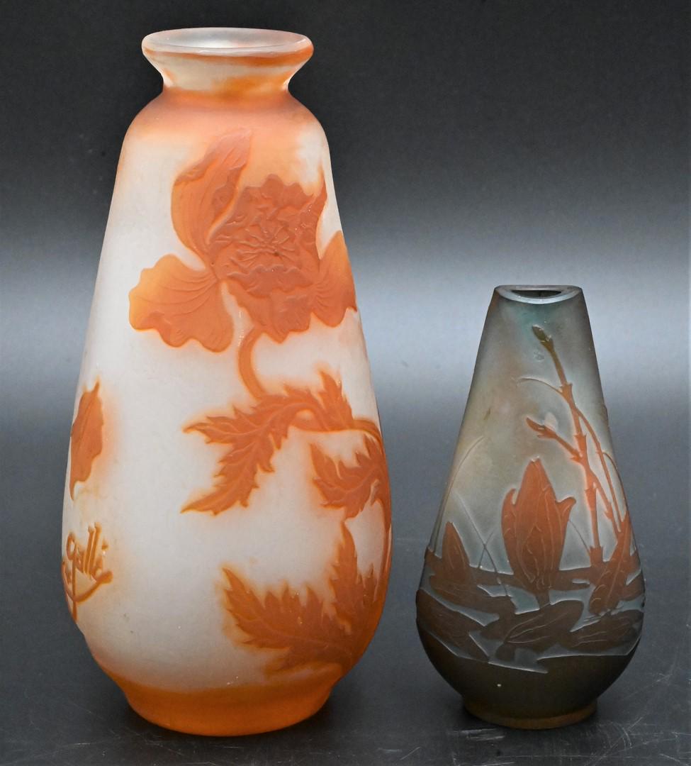Two Galle Cameo Art Glass Vases: Two Galle Cameo Art Glass Vases, to include a small lily pad bud vase, along with a norange cut to frosted glass flower vase; heights 6 and 4 inches. Provenance: From the Estate of Elwyn W. Lemon, Enf