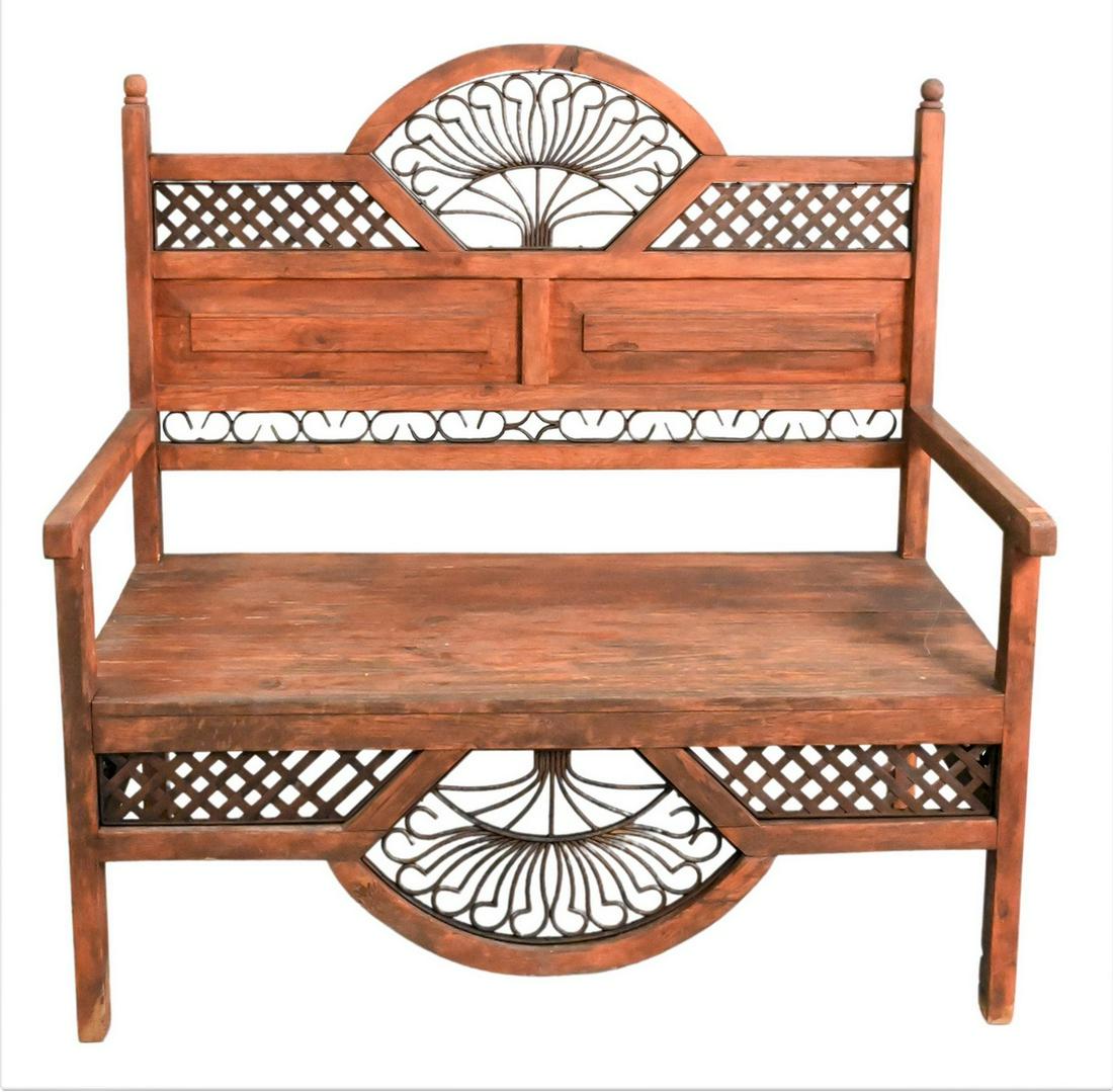 Wood and Iron Bench: Wood and Iron Bench, having tree motif, height 46 inches, width 45 inches.
