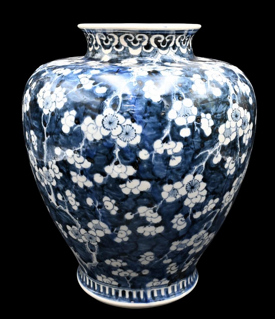 Chinese Porcelain Blue and White Blossom Vase: Chinese Porcelain Blue and White Blossom Vase, having painted blossoming apple tree design with flared rim, 19th century, height 13 3/4 inches, Provenance: From a private New York City collection.