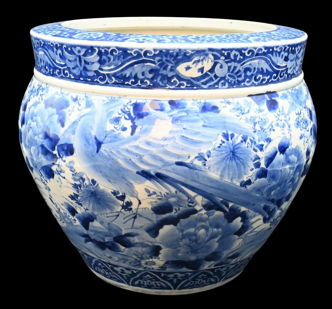 Blue and White Hibachi/Jardiniere: Blue and White Hibachi/Jardiniere, Japan, Meiji Period 19th/20th century, decorated with bird and flower motif, wooden base, height 12 1/2 inches, diameter 14 inches.