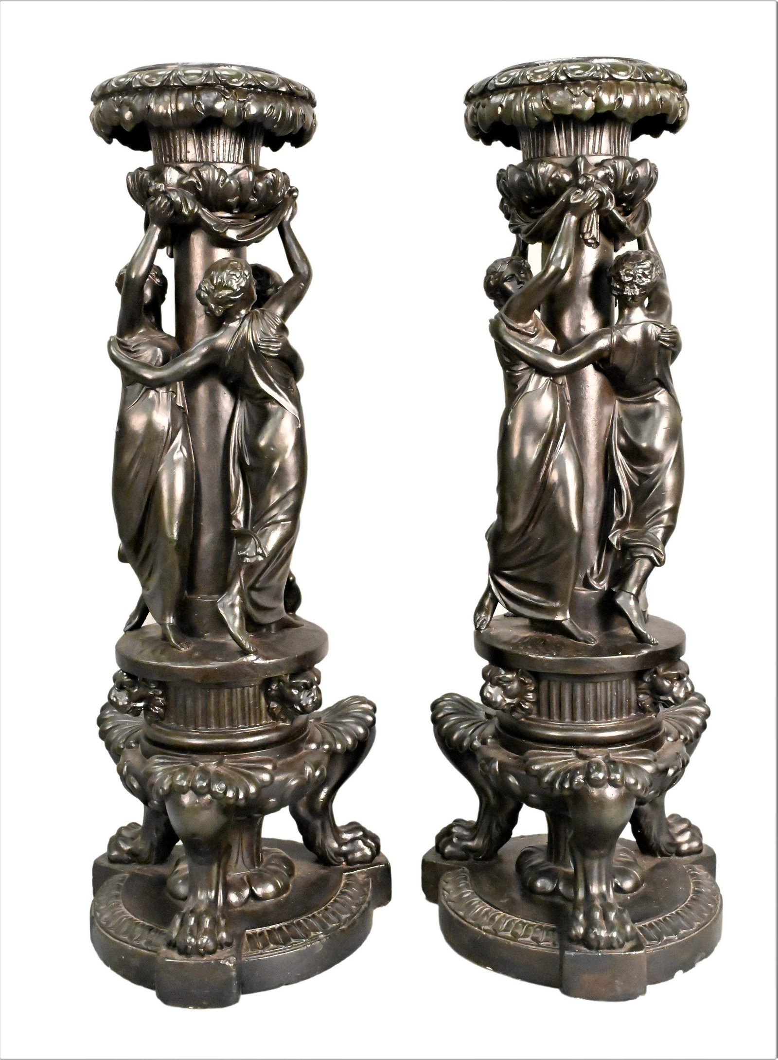 A Pair of Large Plaster Black-Painted Figural Photophores: A Pair of Large Plaster Black-Painted Figural Photophores each base molded with three draped maidens and paw feet, having one hurricane shade height of base 30 1/2 inches, height with shade 50 inches 