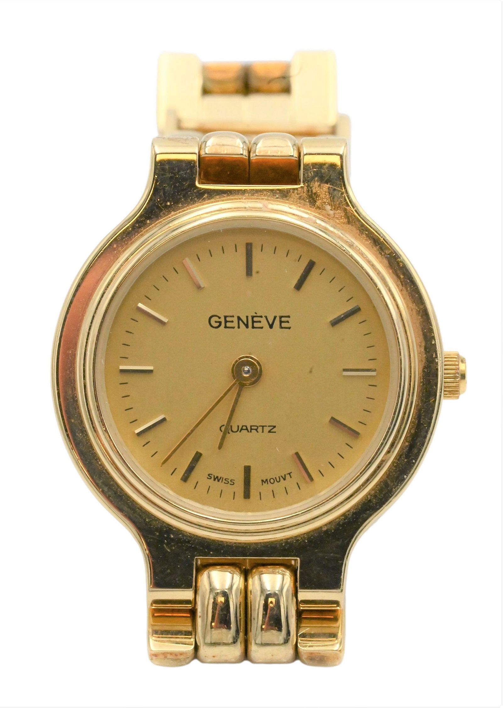 14 Karat Yellow Gold Bracelet Style Lady's "Geneve" wrist watch: 14 Karat Yellow Gold Bracelet Style Lady's "Geneve" wrist watch, the face is round and the dial is a gold tone, the band is a panther style link, the watch is 7" in length, the total weight of the wat