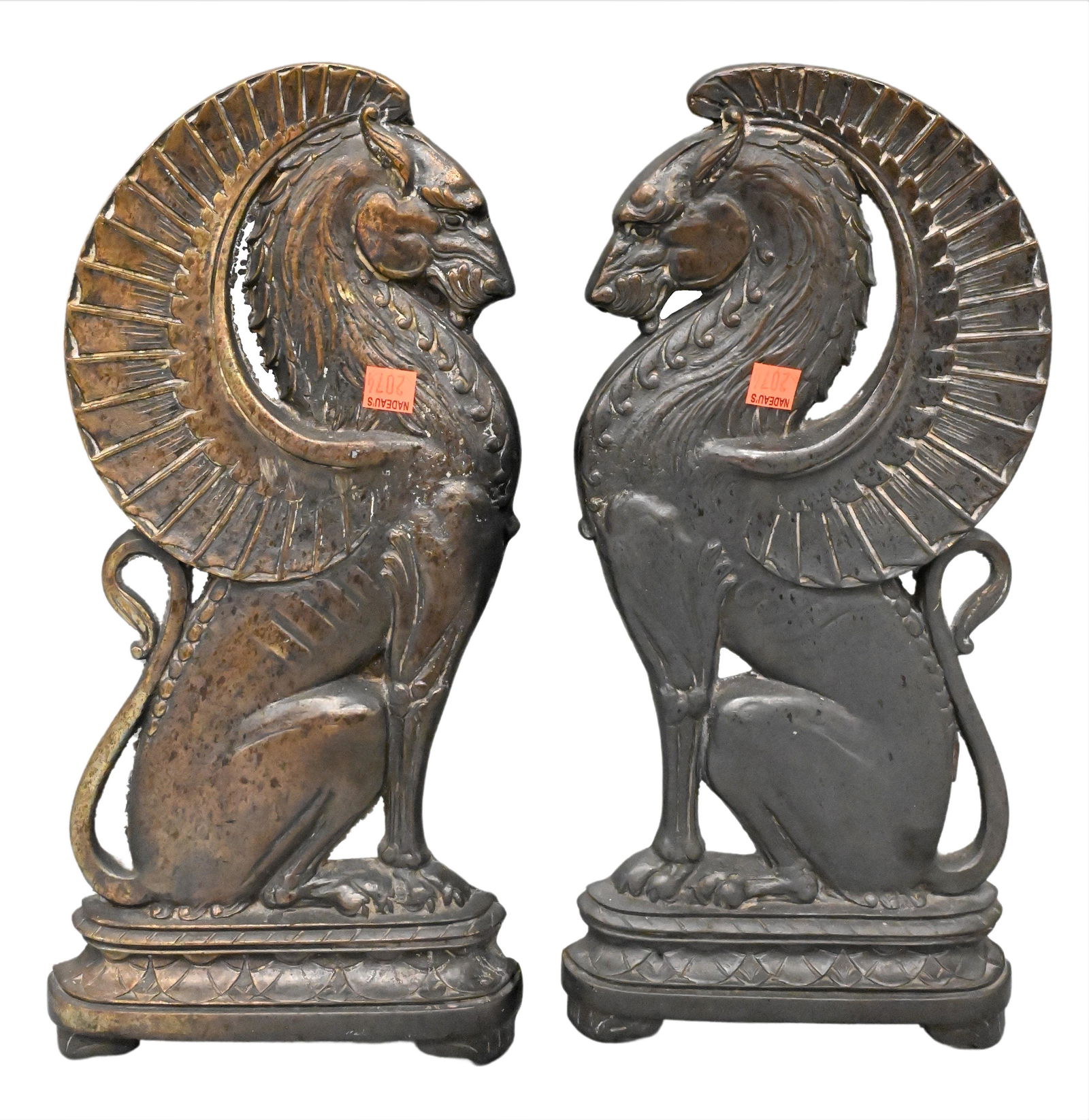 A Pair of Bronze Art Deco Griffin Form Andirons: A Pair of Bronze Art Deco Griffin Form Andirons, height 16 inches.