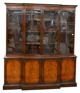 Schmieg + Kotzian Two Part Mahogany Breakfront: Schmieg & Kotzian Two Part Mahogany Breakfront, top having four glass doors opening to interior shelving, set on base having four doors, (one glass pane cracked), height 83 inches, width 72 inches, de