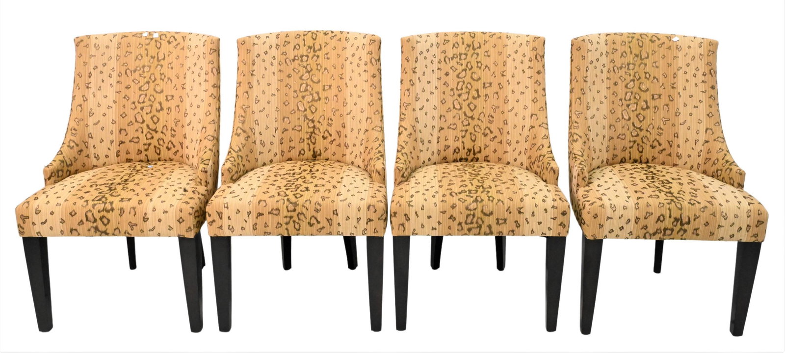 Set of Four Custom Upholstered Dining Chairs: Set of Four Custom Upholstered Dining Chairs, having cheetah print upholstery, height 36 inches.
