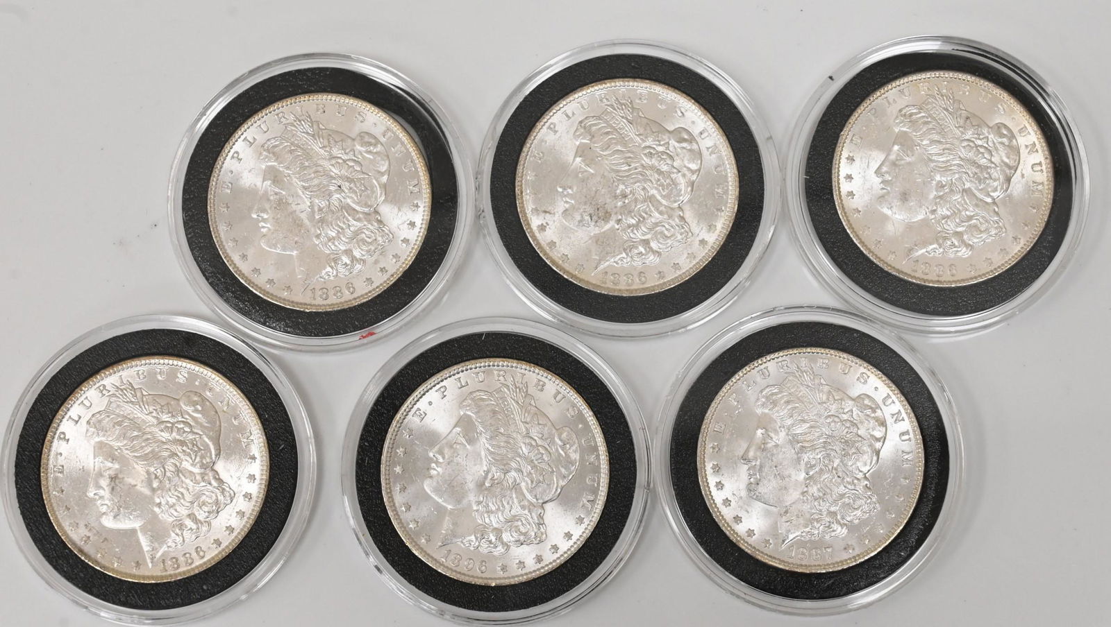 Six Uncirculated Morgan Silver Dollars (1 of 6)