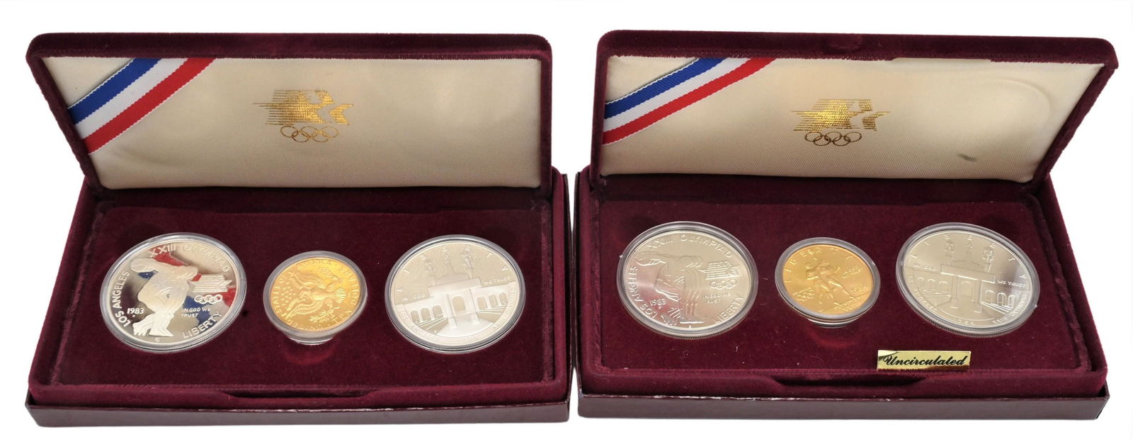 Two 1983/84 Olympic Gold Three Coin Sets (1 of 4)