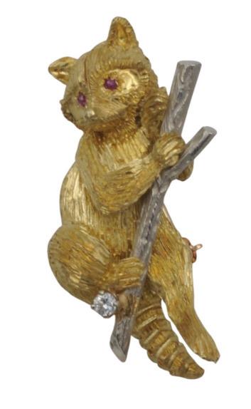 18 Karat Yellow and White Gold Brooch: 18 Karat Yellow and White Gold Brooch, in the form of a racoon on a limb having one diamond, 1 1/2 inches length, 1 1/4 inches width, 13.9 grams