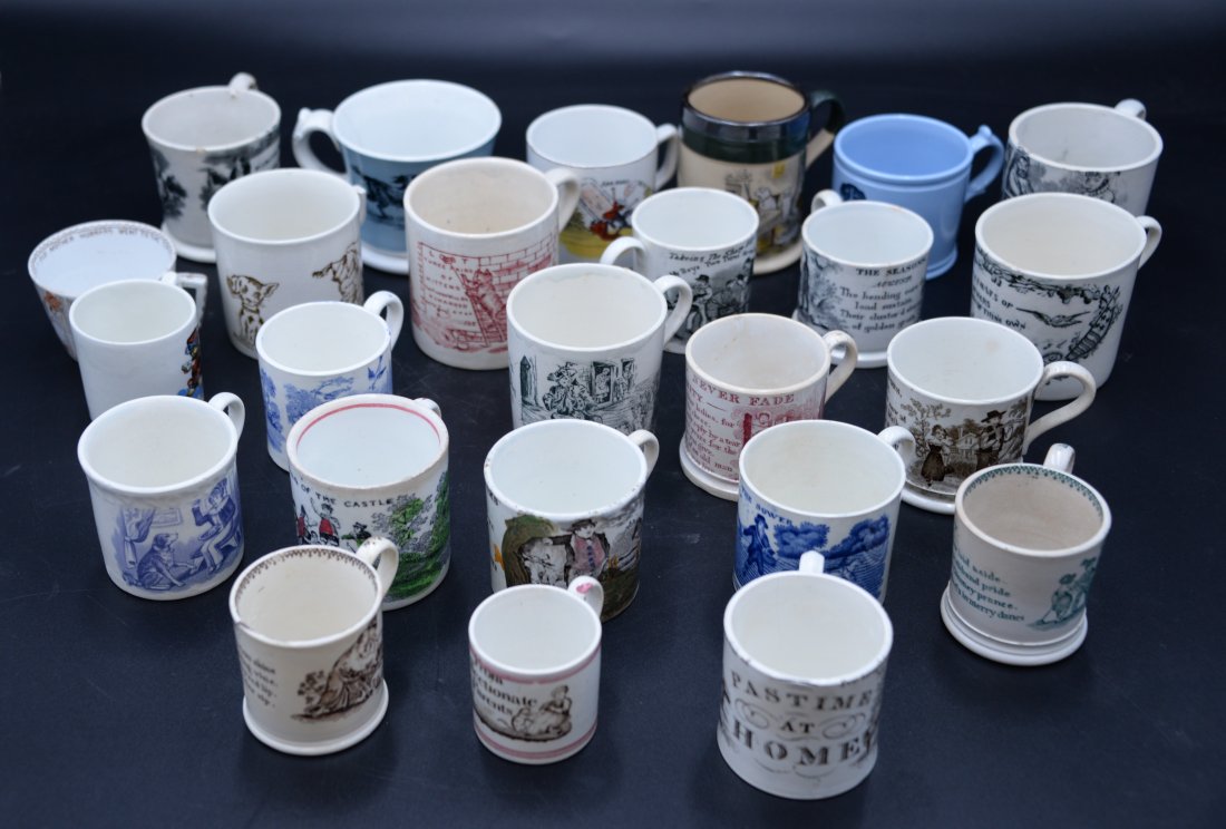 Group of 25 Staffordshire Nursery Rhyme and Month Mugs: Group of 25 Staffordshire Nursery Rhyme and Month Mugs, heights 2 - 3 1/2 inches.