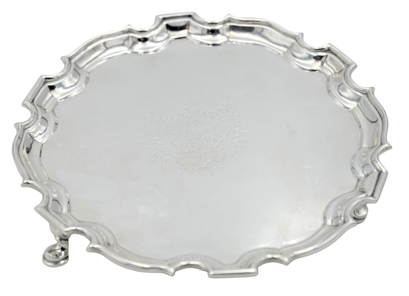 George II Silver Circular Salver: George II Silver Circular Salver, Francis Pages, London, 1733, having Chippendale rim set on three hoof feet, the center engraved with rococo armorials, the underside engraved with initials TBM, diame