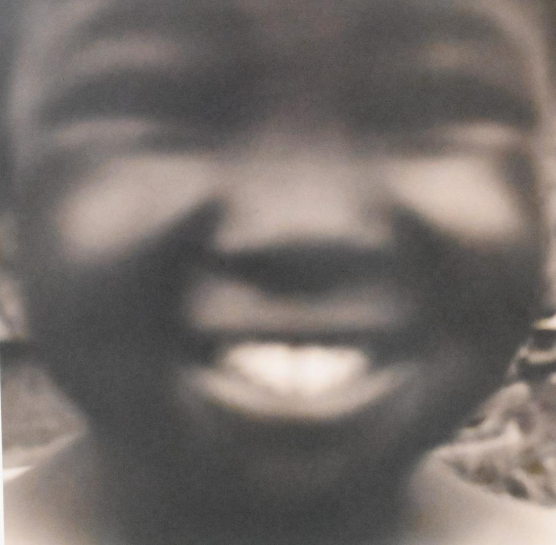 Jack Spencer (American b. 1951): Jack Spencer (American b. 1951) "Happy Child, Como, Mississippi" 1996 gelatin silver print numbered 22/50 and signed in margin lower right 20" x 24"