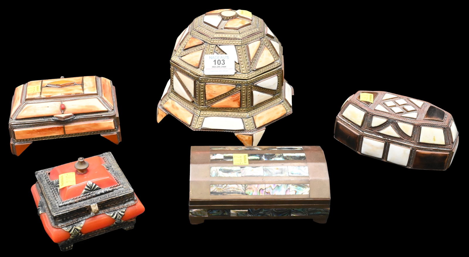 Five Decorative Boxes: Five Decorative Boxes, to include three with stone inlaid and metal geometric design, mother of pearl, brass and wood, along with one orange with felt interior, largest height 6 inches.