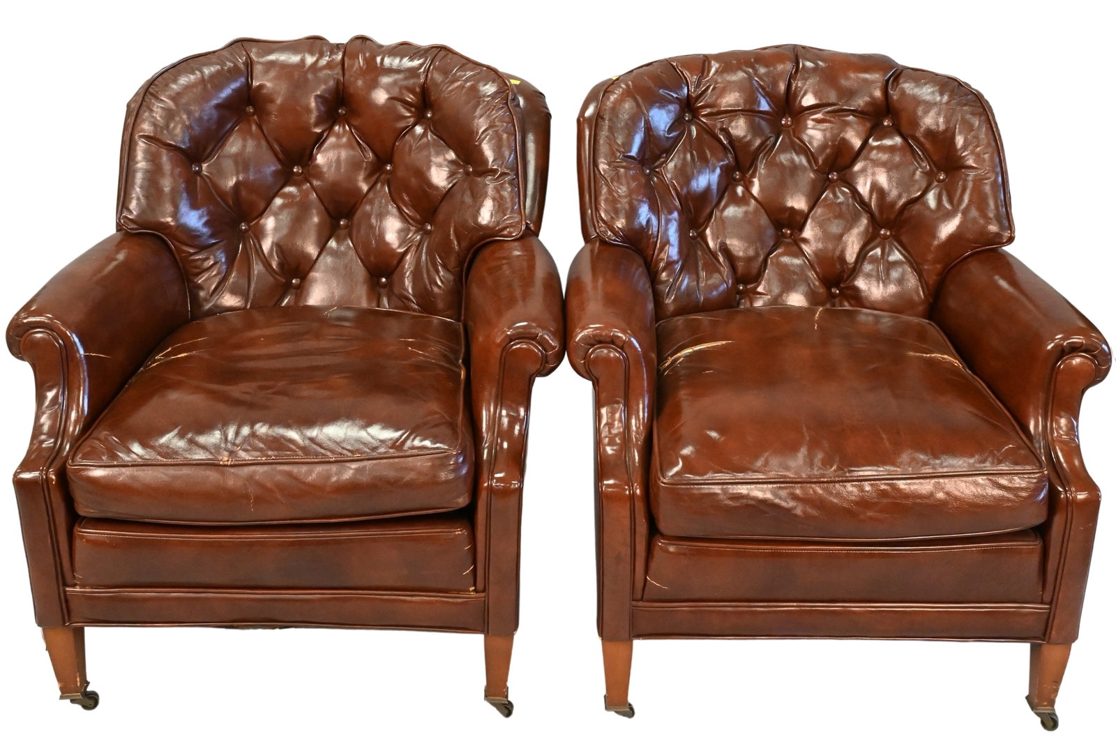 Pair of Bloomingdale Leather Easy Chairs: Pair of Bloomingdale Leather Easy Chairs, having cracks in leather seats, height 31 inches, width 31 inches.