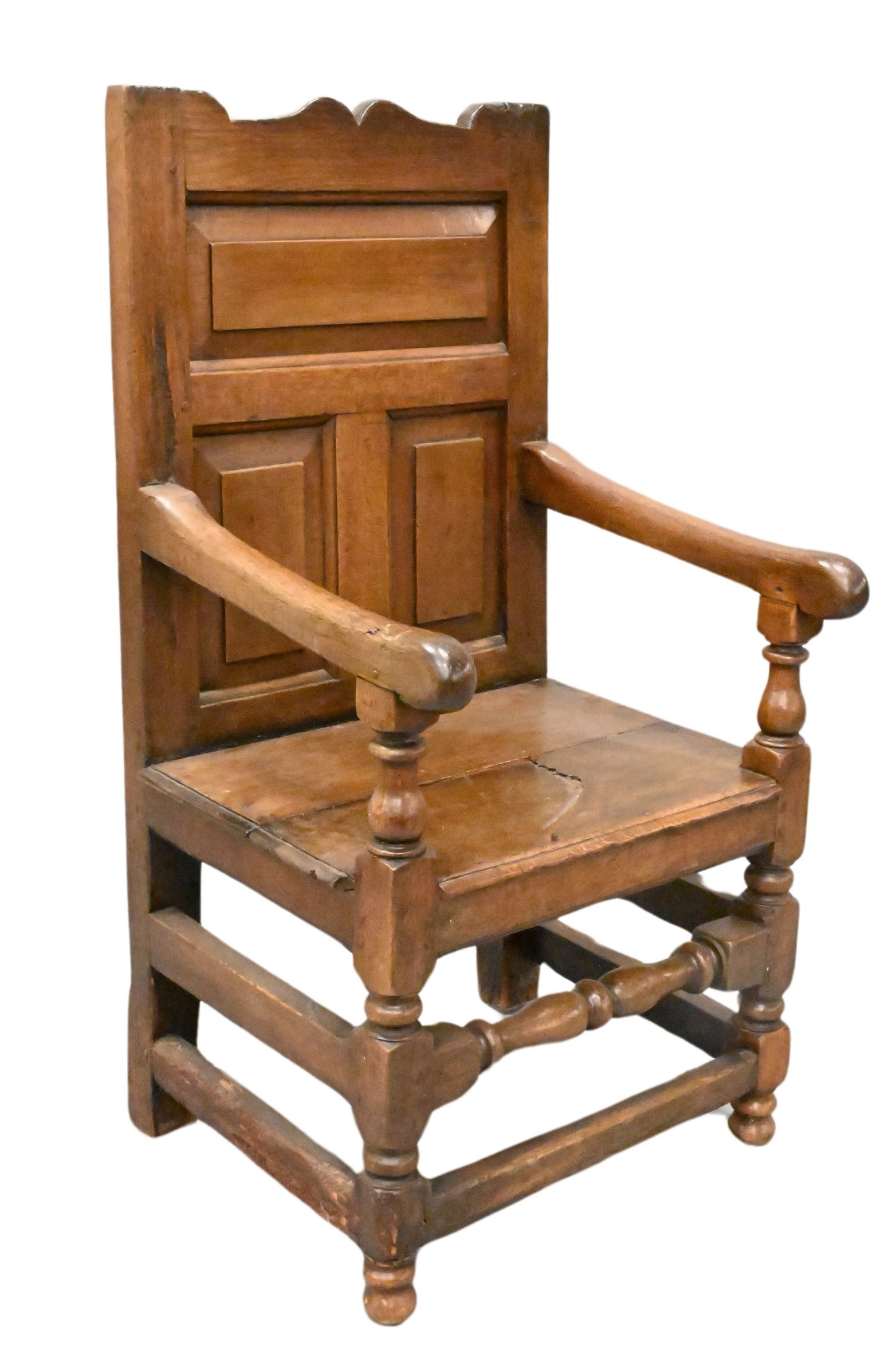 Oak Wainscot Armchair: Oak Wainscot Armchair With raised panel back and plain seat Legs ended out Late 17th to early 18th century Height is 46 1/2 inches, width is 24 inches
