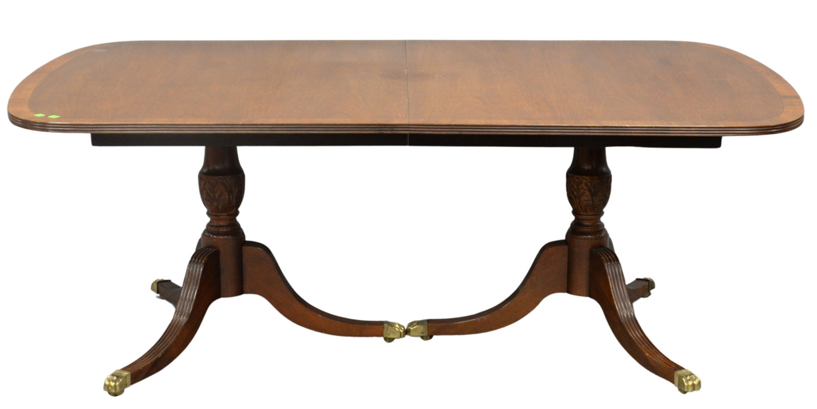 Mahogany Double Pedestal Banded Inlay Dining Table: Mahogany Double Pedestal Banded Inlay Dining Table, having reeded edge, with two 20 inch leaves, slight sun fading, height 29, top 46" x 76", top open 46" x 116"