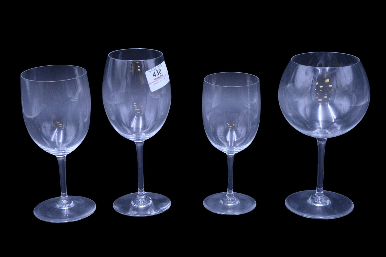 31 Baccarat Stems: 31 Baccarat Stems to Include, four red wine, four brandy, two champagne, four white wine, five large water goblets, 11 small water goblets, decanter