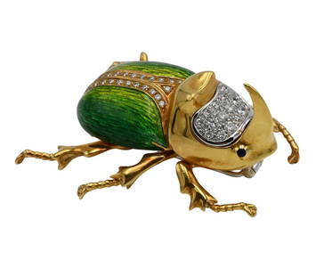 Tiffany & Company 18K Yellow Gold Brooch: Tiffany & Company 18K Yellow Gold Brooch in form of horned beetle set with diamond melee and enameled green body length 1 5/8 inches, 37.2 grams. Provenance: "The Mortimer and Mimi Levitt Estate,