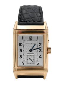 Jaeger LeCoultre 18K Yellow Gold Reverso Mens Wristwatch: Jaeger LeCoultre 18K Yellow Gold Reverso Mens Wristwatch each side with second window, having original leather band mounted with 18K gold 26 mm, total weight 85.5 grams