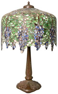 Leaded and Stained Wisteria Design Glass Table Lamp: Leaded and Stained Wisteria Design Glass Table Lamp on Handel base with five sockets height 30 inches, diameter 18 inches Condition: presents well, overall good condition, very minor hairlines to shad