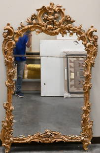 Continental Two Part Mirror: Continental Two Part Mirror having gilt and gesso floral/vine decoration on blue wooden background, 18th to early 19th century height 64 inches, width 39 inches Provenance: A private collection from F