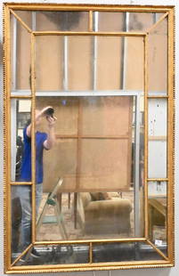 George III Giltwood Mirror: George III Giltwood Mirror having carved giltwood and mirrored frame, late 18th century height 57 1/4 inches, width 37 inches Provenance: purchased from Sotheby's October 20, 2001 ($9,742) Condition:
