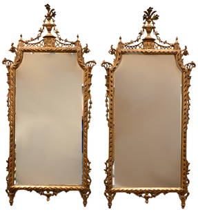 Pair of Giltwood Pier Mirrors: Pair of Giltwood Pier Mirrors having molded and pierced cornice, borders and apron, late 20th century height 60 inches, width 27 inches Provenance: Estate of Dina Recanati, 944 5th Ave, New York