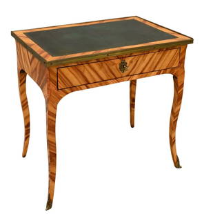 North European Cocus Wood and Ormolu Mounted Writing Table: North European Cocus Wood and Ormolu Mounted Writing Table having tooled-leather inset top with brass trim over a frieze drawer, mid-19th century height 28 3/4 inches, width 29 1/2 inches, depth 20 3/