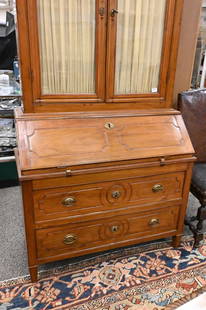 Neoclassical Fruitwood Bureau-Bookcase: Neoclassical Fruitwood Bureau-Bookcase having a molded rectangular cornice, over a pair of doors over a slant front bureau over two long drawers on tapered square feet, North Italian or South German,