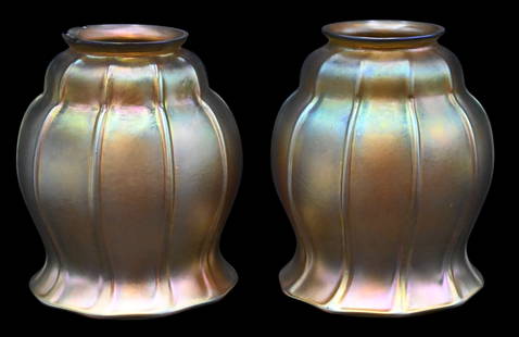 Pair of Steuben Gold Iridescent Art Glass Shades: Pair of Steuben Gold Iridescent Art Glass Shades marked Steuben, having silver fleur-de-lis mark Condition: present well, chip on rim, minor surface scratches