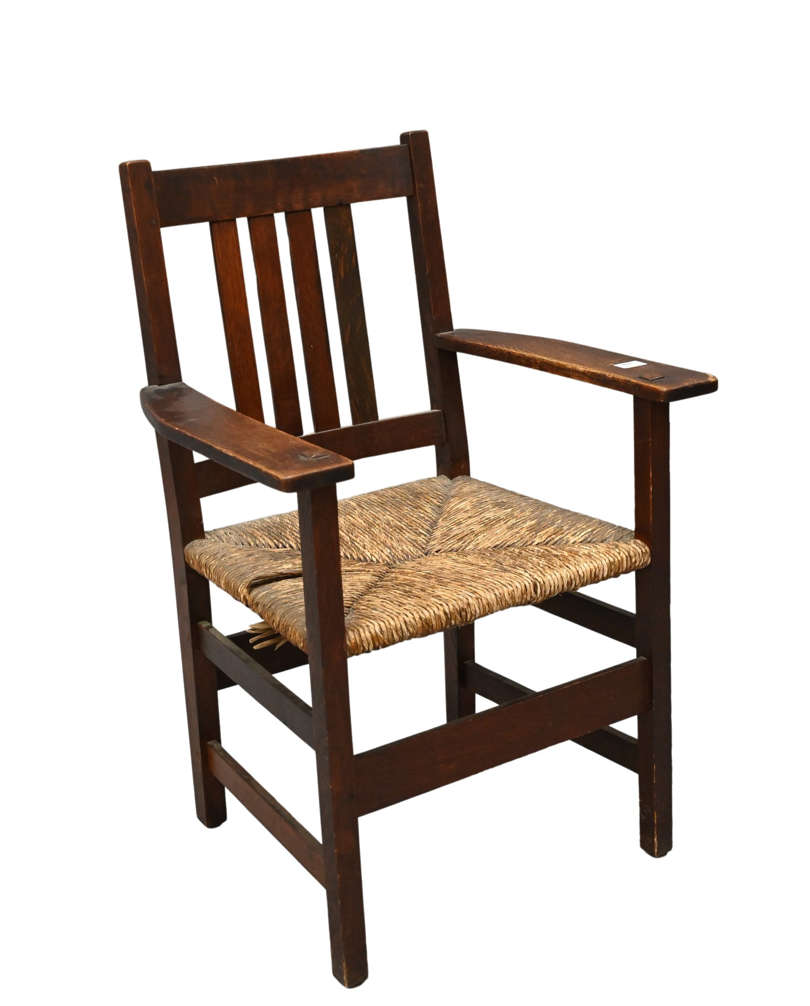 L. and J.G. Stickley Armchair: L. and J.G. Stickley Armchair with firm's original decal, oak with rush seat, circa 1910 height 37 1/2 inches, width 24 7/8 inches, depth 21 inches