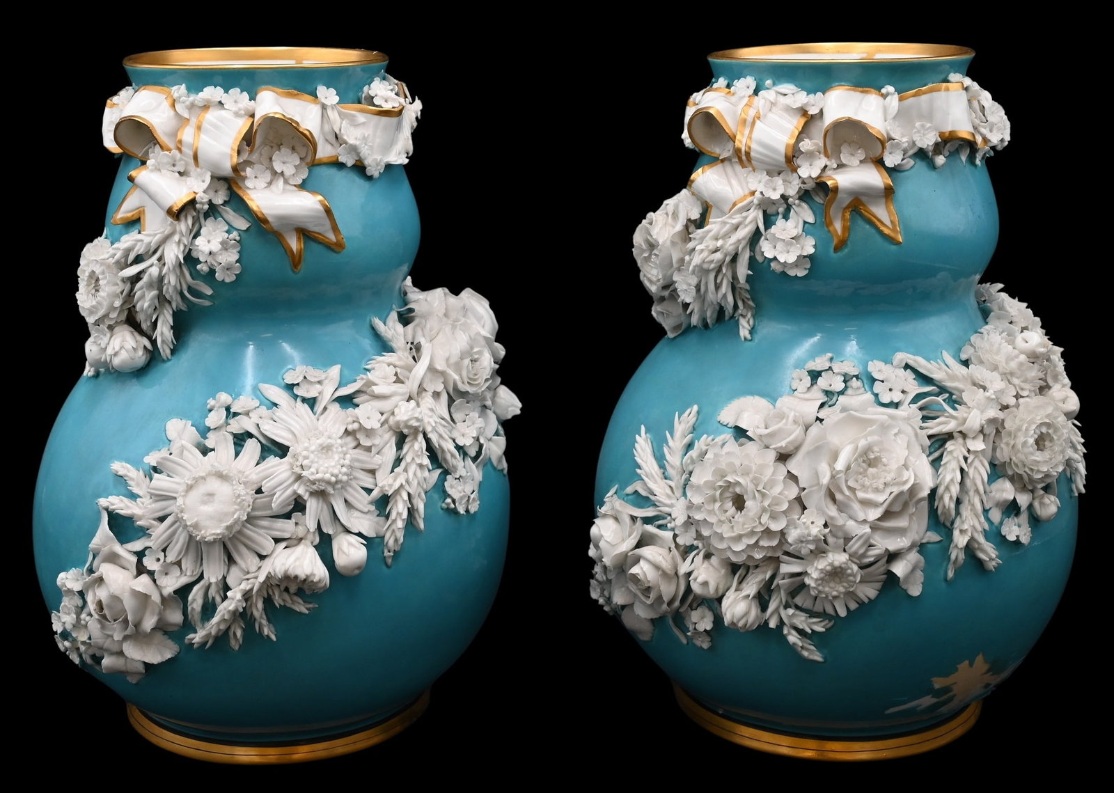 A Pair of I Borbone De Capodimonte Porcelain Vases: A Pair of I Borbone De Capodimonte Porcelain Vases having light blue base color with raised flower decoration and ladybug gilt painted ribbon height 11 inches one sold as is Provenance: Estate of Shei