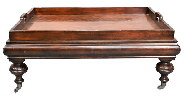 Mahogany Tray Top Coffee Table: Mahogany Tray Top Coffee Table having bold turned legs set on brass casters, attributed to Ralph Lauren height 18 1/2 inches, top 35" x 43".