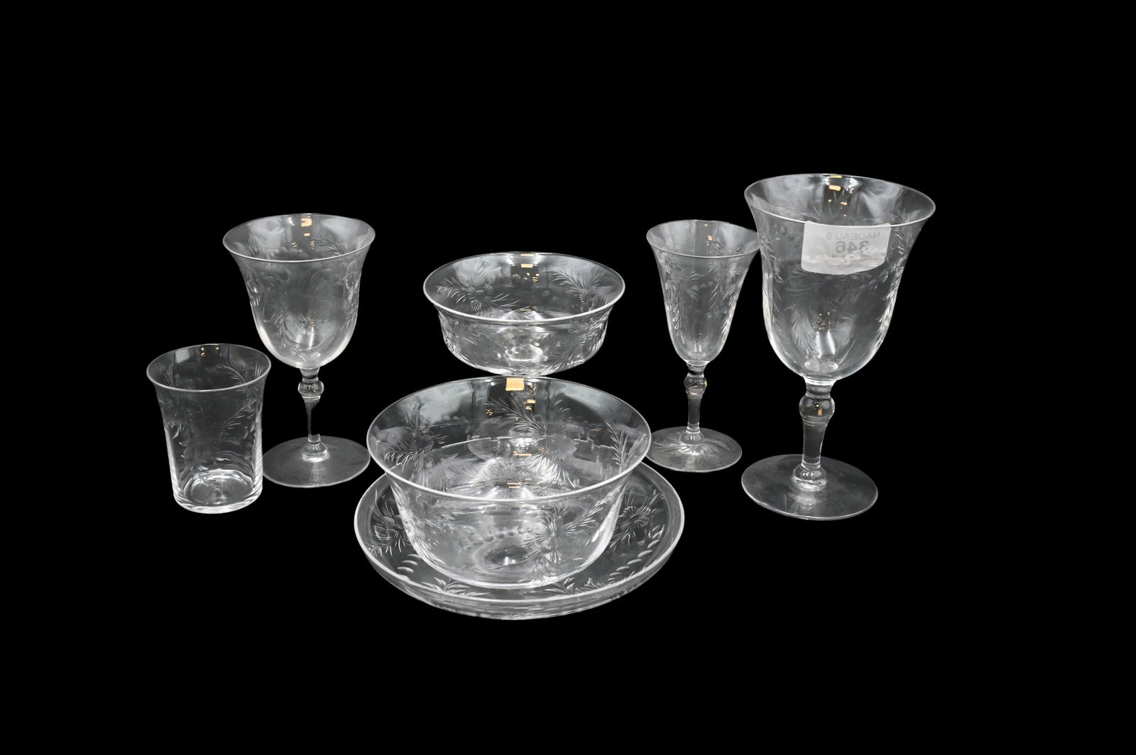 Hawkes Style 86 Piece Etched Glassware Service: Hawkes Style 86 Piece Etched Glassware Service 12 coupe cocktail glasses, 10 water goblets, 10 cordials, 1 wine ewer, 1 decanter, 10 cordials, 1 dinner bell, 12 finger bowls, 12 under plates, 12 tumbl