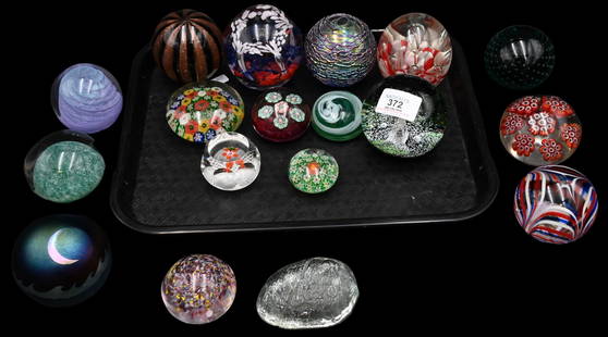 Group of 18 Glass Paperweights: Group of 18 Glass Paperweights to include Perthshire flower, Murano, New England Glass Company "1620" weight, some signed, etc. Height of largest 3 inches