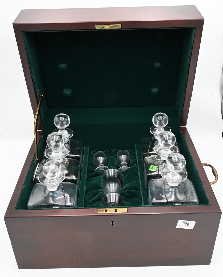 Decanter Set in Fitted Mahogany Case: Decanter Set in Fitted Mahogany Case having six glass bottles with stoppers and four glasses case height 12 1/2 inches, top 13 1/2" x 18 1/2"