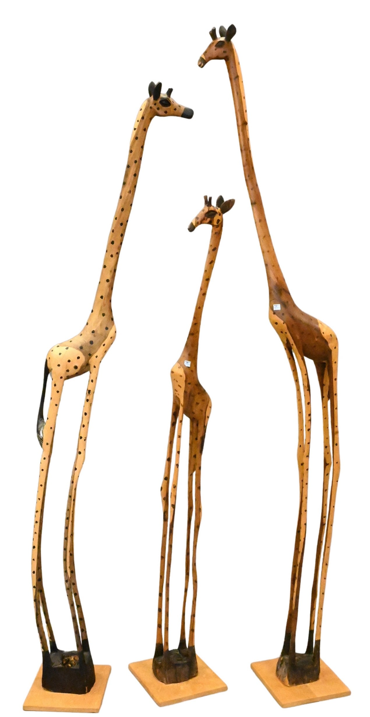 Three Carved Wood and Painted Giraffe Figures (1 of 8)