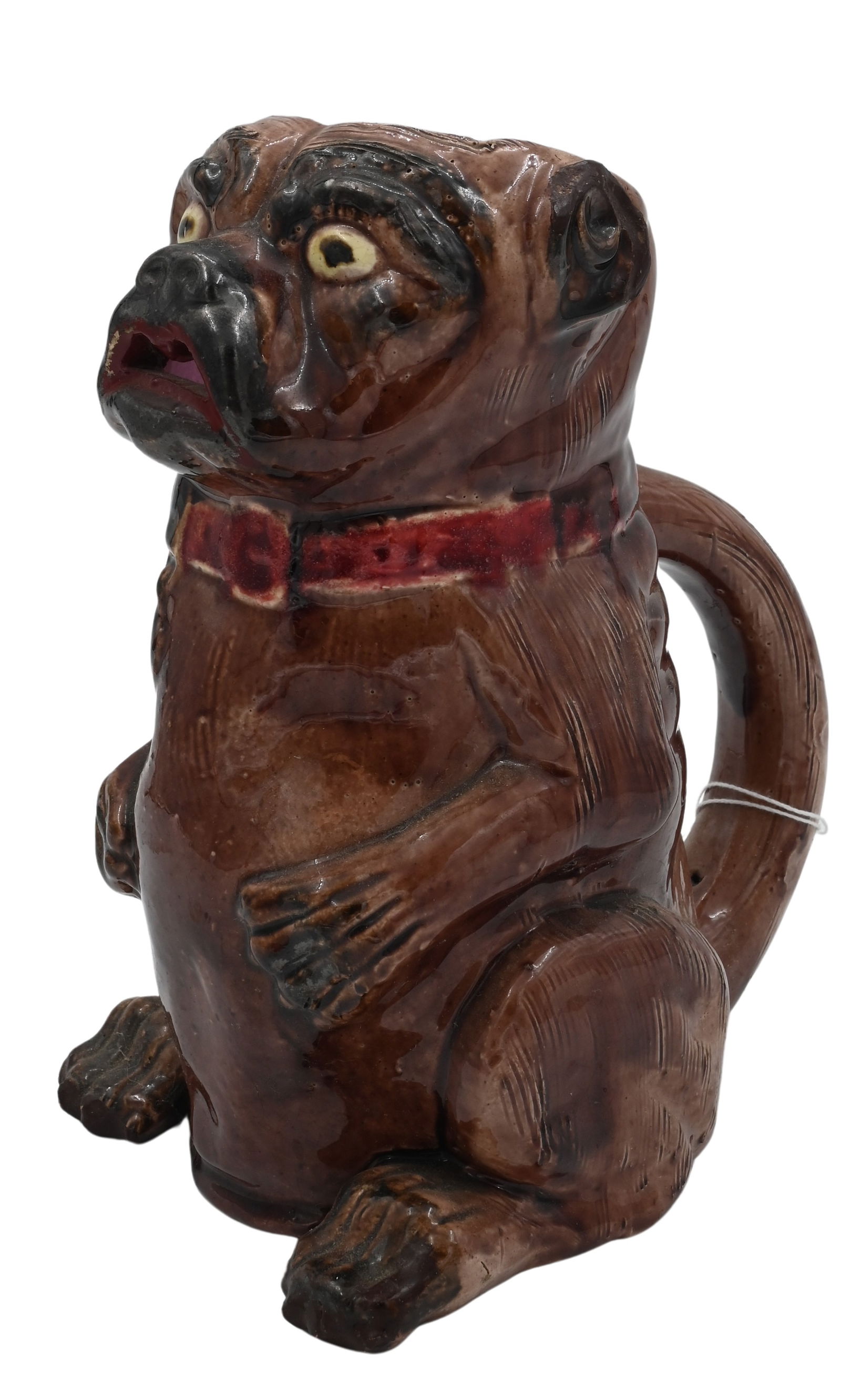 Majolica Pug/Bulldog Pitcher: Majolica Pug/Bulldog Pitcher having large handle height 9 inches Provenance: Estate of Michael and Elizabeth Ponak Pomfret Center, Connecticut
