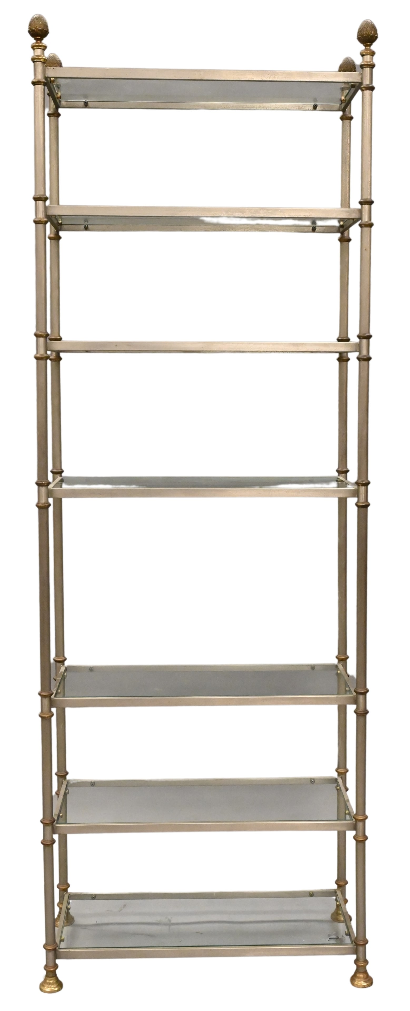 Metal and Glass Etagere: Metal and Glass Etagere having six shelves and pineapple finials height 82 inches, length 27 1/2 inches, depth 12 inches Provenance: Thomas F. Vanderbeck Revocable Trust Haddam, Connecticut