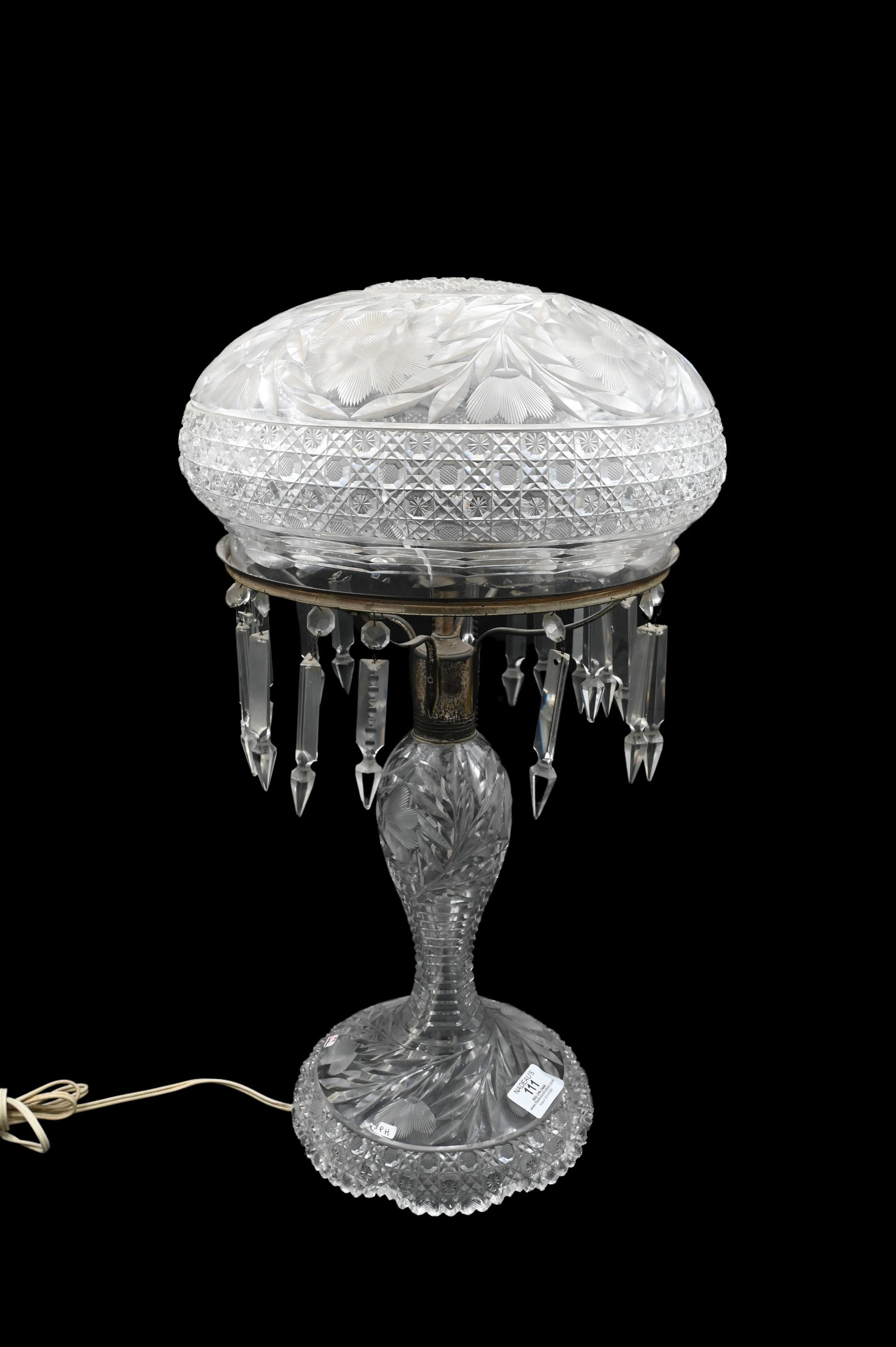 American Brilliant Cut Glass Lamp: American Brilliant Cut Glass Lamp having mushroom or dome shaped shade and prism accents height 22 inches Provenance: From Collection of Steven and Paula Schimmel Woodstock, Connecticut