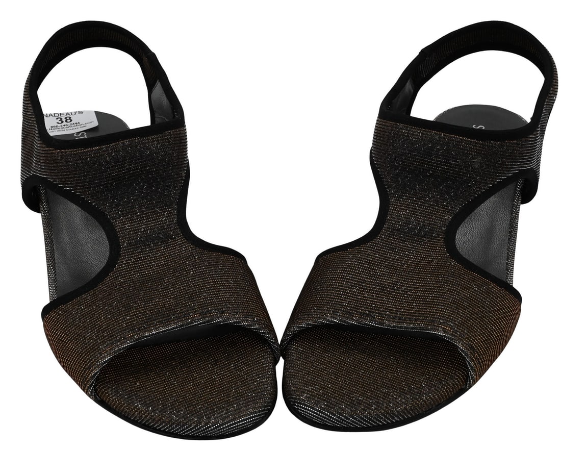 Pair of Stuart Weitzman Women's Wedge Heels: Pair of Stuart Weitzman Women's Wedge Heels in gold and silver, leather sole, unknown size (approximately size 8) Condition: does not appear to be worn