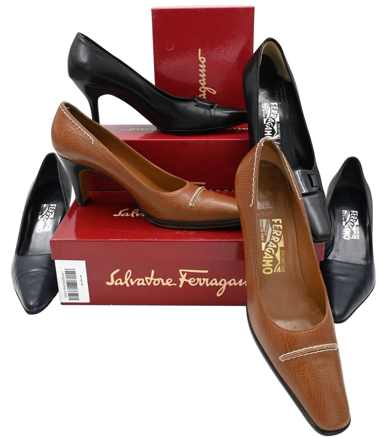 Three Pairs of Salvatore Ferragamo Women's Shoes to include: Three Pairs of Salvatore Ferragamo Women's Shoes to include "Firma" 7 cm in midnight, "Pepita" 7 cm in pebble brown, "Desideria" 5 cm in black, size 9 Condition: all worn, in box and packaging