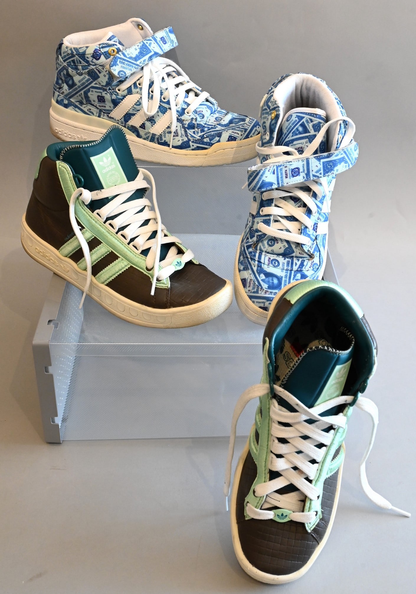 Two Pairs of Men's Adidas Sneakers: Two Pairs of Men's Adidas Sneakers Adidas Sneakers Adicolor Hi in Brown and Mint Green Used with few scuffs and stains, Retails for $100 Size 8.5 Adidas Sneakers Forum Hi Money in Blue Slightly used w